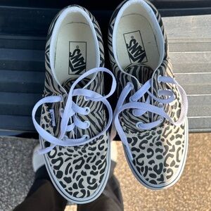 Multi pattern lace up Vans 6.5 size. Tiger print slip on Vans. 7.0. Worn 2 times